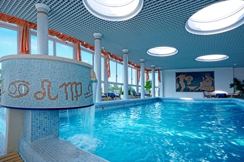 Indoor pool, outdoor pool, open 8 AM to 7:00 PM, pool umbrellas
