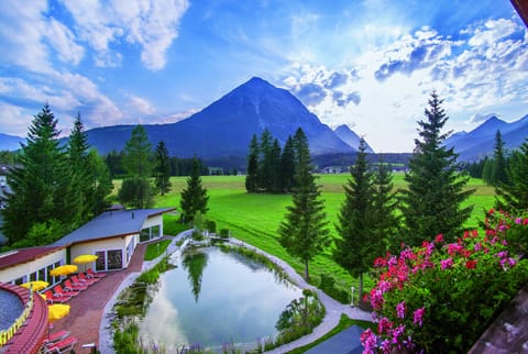 Indoor pool, 2 outdoor pools, open 7:00 AM to 8:00 PM, pool umbrellas