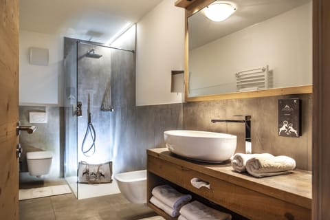 Shower, eco-friendly toiletries, hair dryer, bathrobes