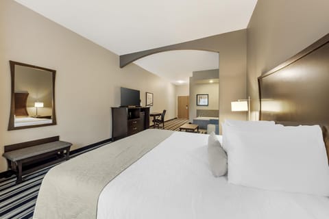 Suite, 1 King Bed, Non Smoking, Jetted Tub (Larger Room;with Sofabed) | Premium bedding, pillowtop beds, desk, laptop workspace