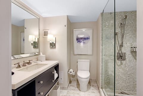 Shower, designer toiletries, hair dryer, bathrobes