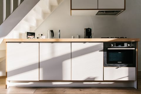 Mini-fridge, coffee/tea maker, electric kettle, highchair