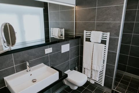 Hair dryer, towels, soap, shampoo