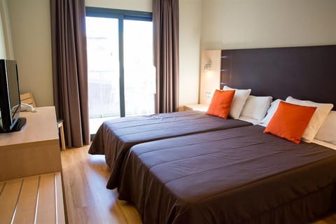 Double Room Single Use, Balcony | Pillowtop beds, desk, blackout drapes, free WiFi