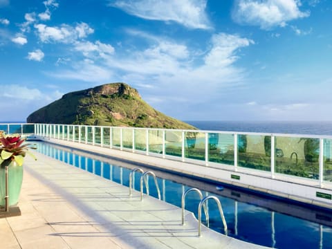 Outdoor pool, open 8:00 AM to 8 PM, sun loungers