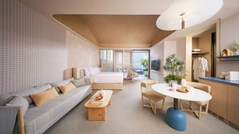 Sunset Terrace Suite | Minibar, in-room safe, blackout drapes, soundproofing