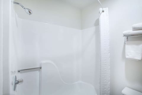 Bathtub, hair dryer, towels