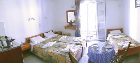 Economy Studio Triple (semi-basement) | In-room safe, free WiFi