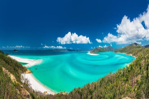 Beach nearby, white sand, beach towels