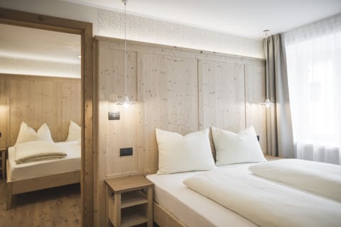 Junior Suite, 2 Bedrooms (Family Maria) | In-room safe, desk, laptop workspace, blackout drapes