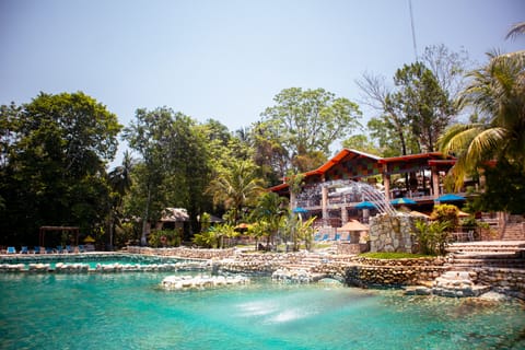 Outdoor pool, cabanas (surcharge), pool umbrellas