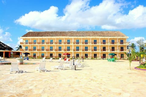 On the beach, free beach cabanas, beach towels, beach volleyball