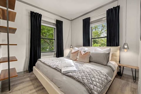 The apartment's KING bed does not disappoint. Complete with luxury bedding & memory foam mattress. Windows with views of downtown by day & black out curtains by night.