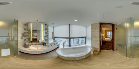 Combined shower/tub, free toiletries, hair dryer, slippers