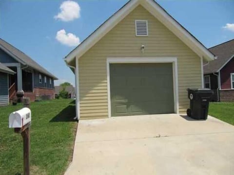 One Car Garage Behind Home