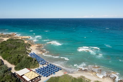 Private beach, free beach shuttle, sun loungers, beach umbrellas