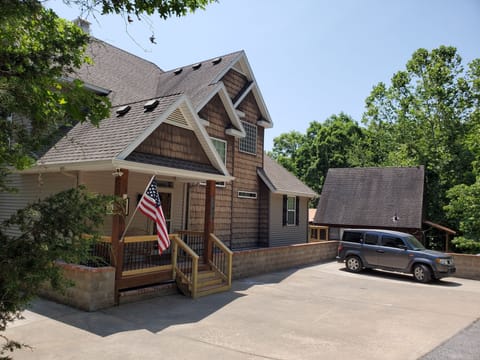 Front Side of House.  Enough parking for 5 cars.  Extra room for parking at the 