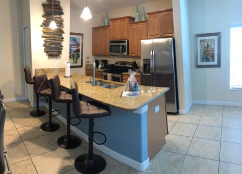 Townhome, 5 Bedrooms | Living area | 60-inch Smart TV with cable channels, TV, Netflix