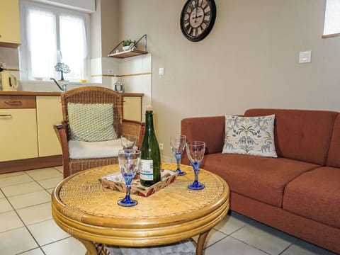 Furniture, Table, Property, Couch, Building, Window, Azure, Wood, Lighting, Cabinetry