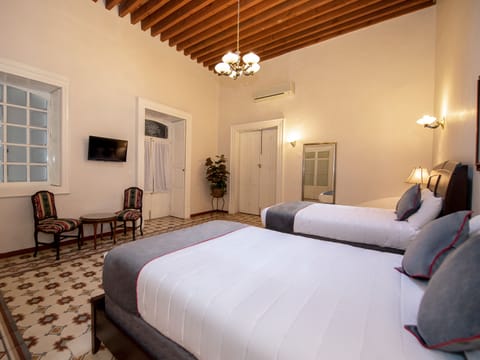 Suite, 2 Bedrooms | Down comforters, in-room safe, iron/ironing board, free WiFi