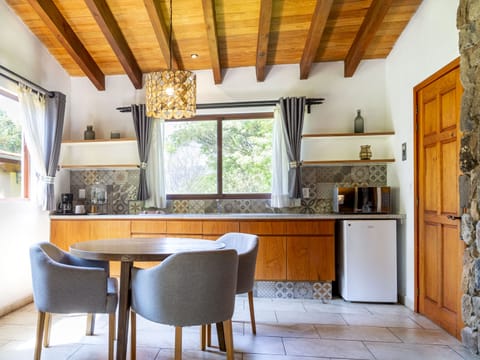 Comfort Suite, Multiple Beds | Private kitchenette | Mini-fridge, stovetop, espresso maker, cookware/dishes/utensils