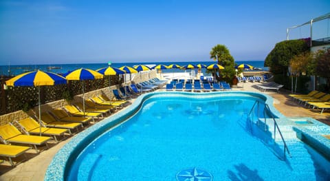 Outdoor pool, pool umbrellas, sun loungers