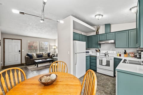 Semi-open kitchen floor plan from the dining room viewing the living room.