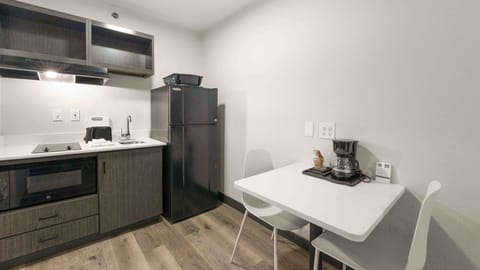 Mini-fridge, microwave, dining tables