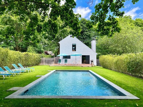 Swim, lounge, BBQ, & dine by the lovely, private, heated, gunite swimming pool.