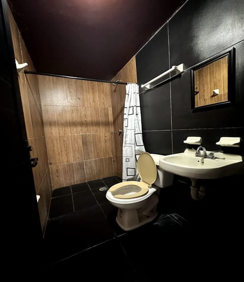 Standard Room, 2 Double Beds | Bathroom | Shower, free toiletries, slippers, towels