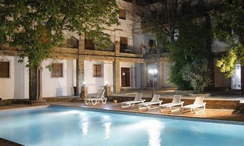 Seasonal outdoor pool, open 11:00 AM to 8:00 PM, sun loungers