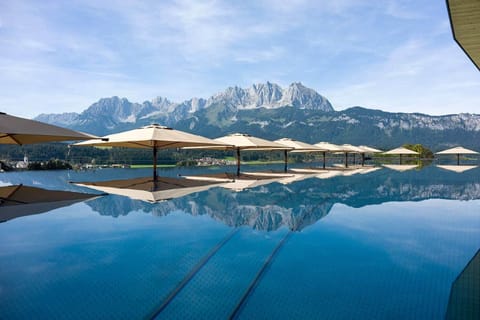 Outdoor pool, pool umbrellas, sun loungers