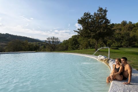 Indoor pool, outdoor pool, pool umbrellas, sun loungers