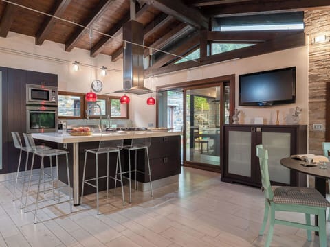 Furniture, Kitchen, Interior Design, Flooring, Light Fixture, Countertop, Ceiling, Wood, Chair, Home