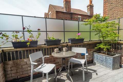 Private terrace with outdoor seating. Great for a morning coffee or alfresco dining