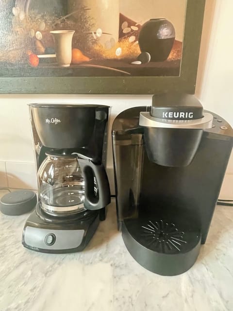 Drip, Keurig and pour over coffee maker on hand. Admitted coffee snob!