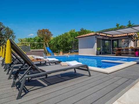 Sky, Swimming Pool, Building, Water, Sunlounger, Azure, Shade, Outdoor Furniture, Wood, Tree