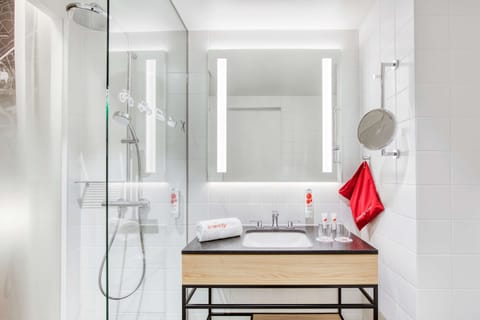 Shower, rainfall showerhead, hair dryer, towels