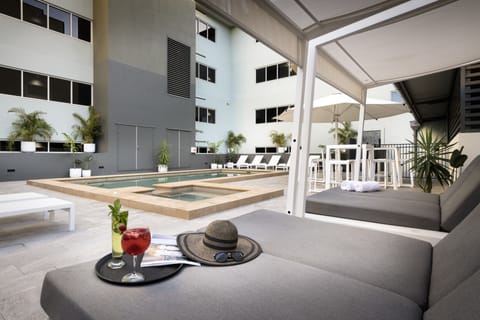 Outdoor pool, pool umbrellas, sun loungers