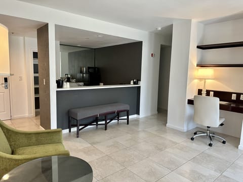 Suite, 1 King Bed, Non Smoking, Jetted Tub (Balcony) | Desk, laptop workspace, blackout drapes, iron/ironing board