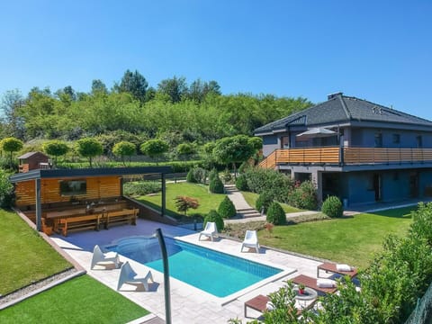 Plant, Sky, Water, Building, Tree, Swimming Pool, Land Lot, Shade, Leisure, Chair