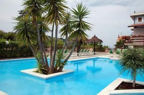 Outdoor pool, open 9:00 AM to 7:00 PM, pool umbrellas, sun loungers