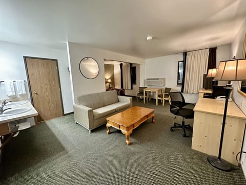 Suite, 1 King Bed, Non Smoking | Desk, blackout drapes, free WiFi, bed sheets