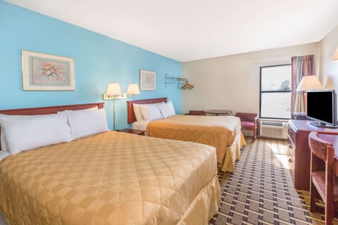 Desk, blackout drapes, free cribs/infant beds, rollaway beds