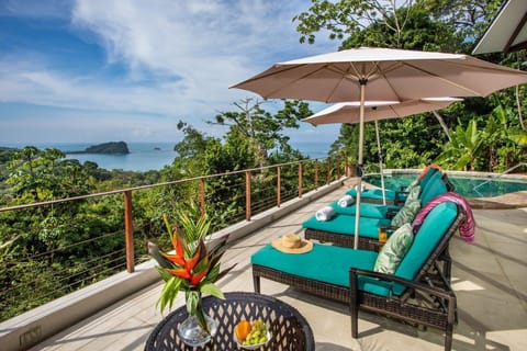Grand ocean view deck, behind the infinity pool. Always cool and relazing