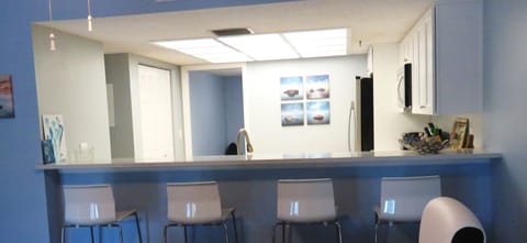 Kitchen counter with bar stools