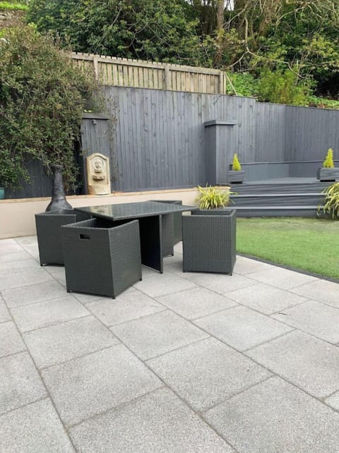 Enclosed patio leading out from the kitchen - perfect for pooches and children. 