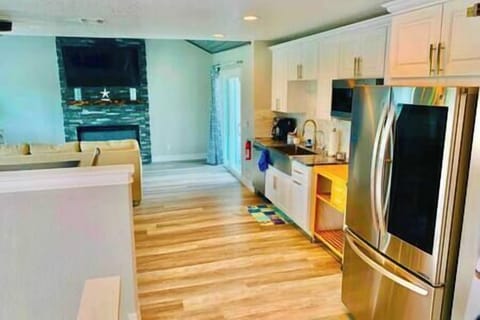 Upstairs living area and full kitchen