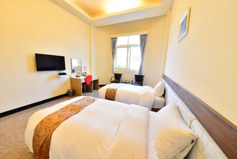 Double or Twin Room | Down comforters, desk, blackout drapes, free WiFi