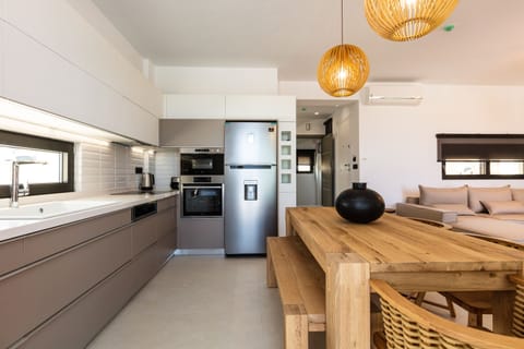 Kitchens are equipped with branded electrical appliances